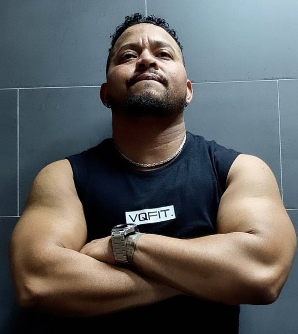 Ty, the personal trainer behind Ty PT-Fitness, arms folded.